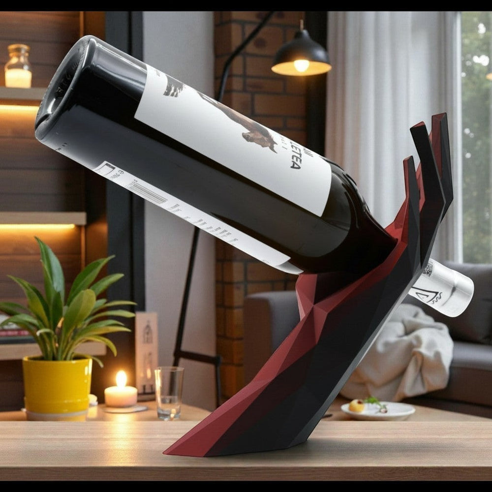Tom GO modern geometric wine bottle holder in black and red acrylic, shaped like a hand.