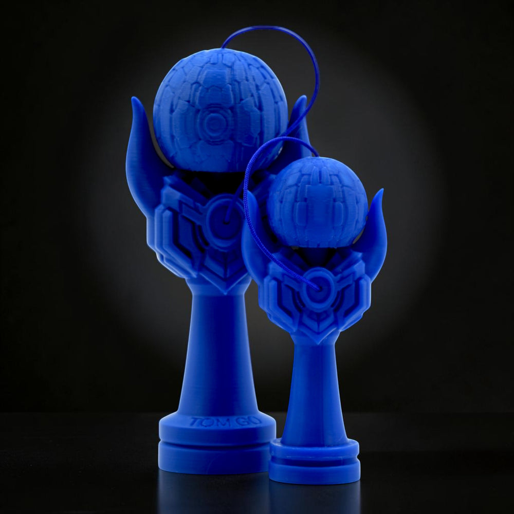 TOM GO Kendama Geeker Iron M, a blue 3D printed kendama with a unique, futuristic design. Features a textured tama and a stylized cup.