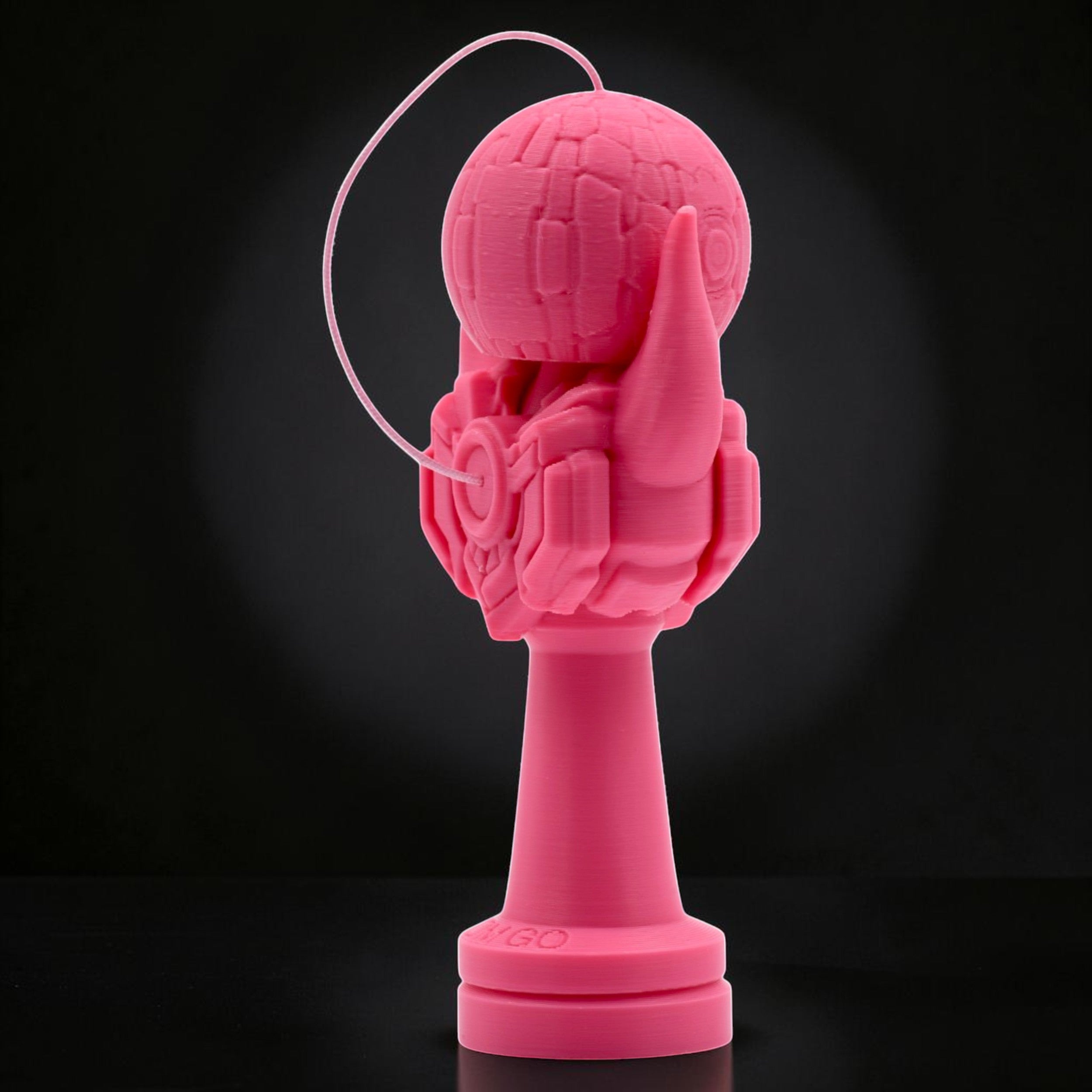 Tom GO Kendama Geeker Iron M, a bright pink 3D printed kendama with a robotic hand design holding a textured tama.
