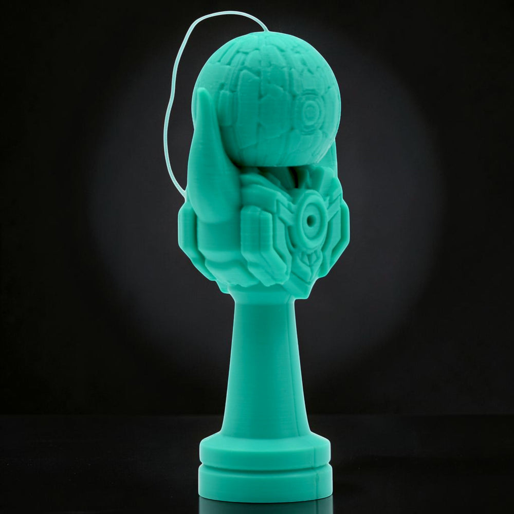 Tom Go Kendama Geeker Iron M, a teal kendama with a futuristic, armored design and a textured ball.