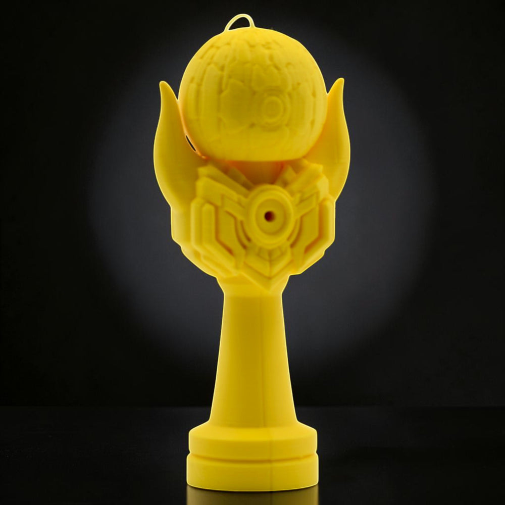 Tom GO Kendama Geeker Iron M, a bright yellow kendama with a unique armored design and textured tama.