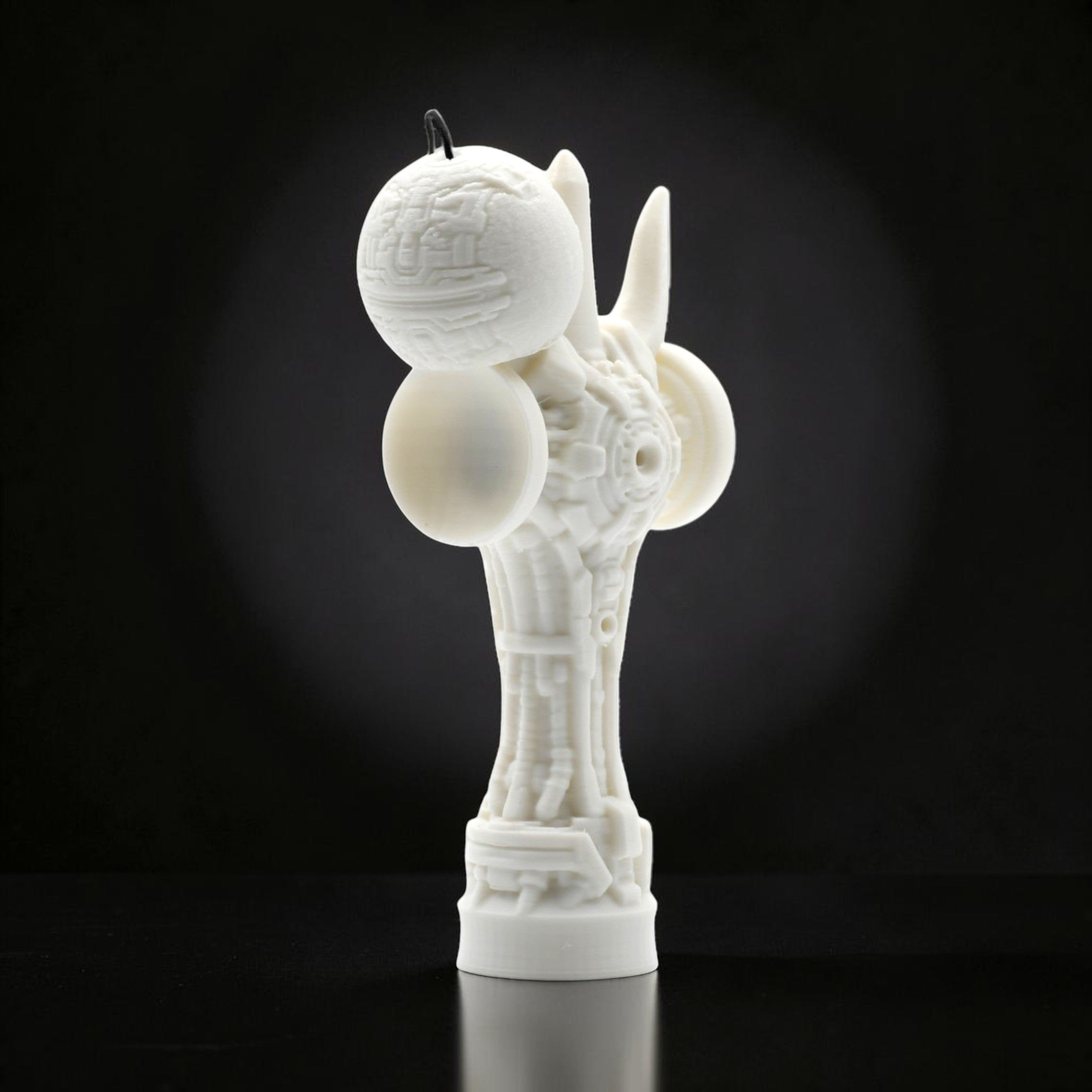 Tom GO Geeker TOM Angel white kendama with intricate geometric design and detailed sphere.