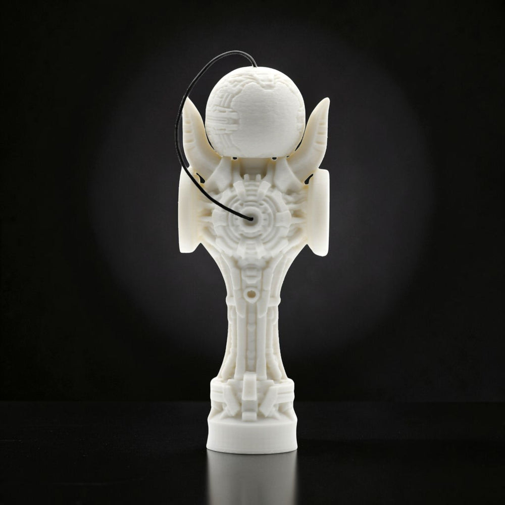 Tom GO Kendama Geeker TOM Angel, a white, intricately designed skill toy with a futuristic, geometric aesthetic and a black string.