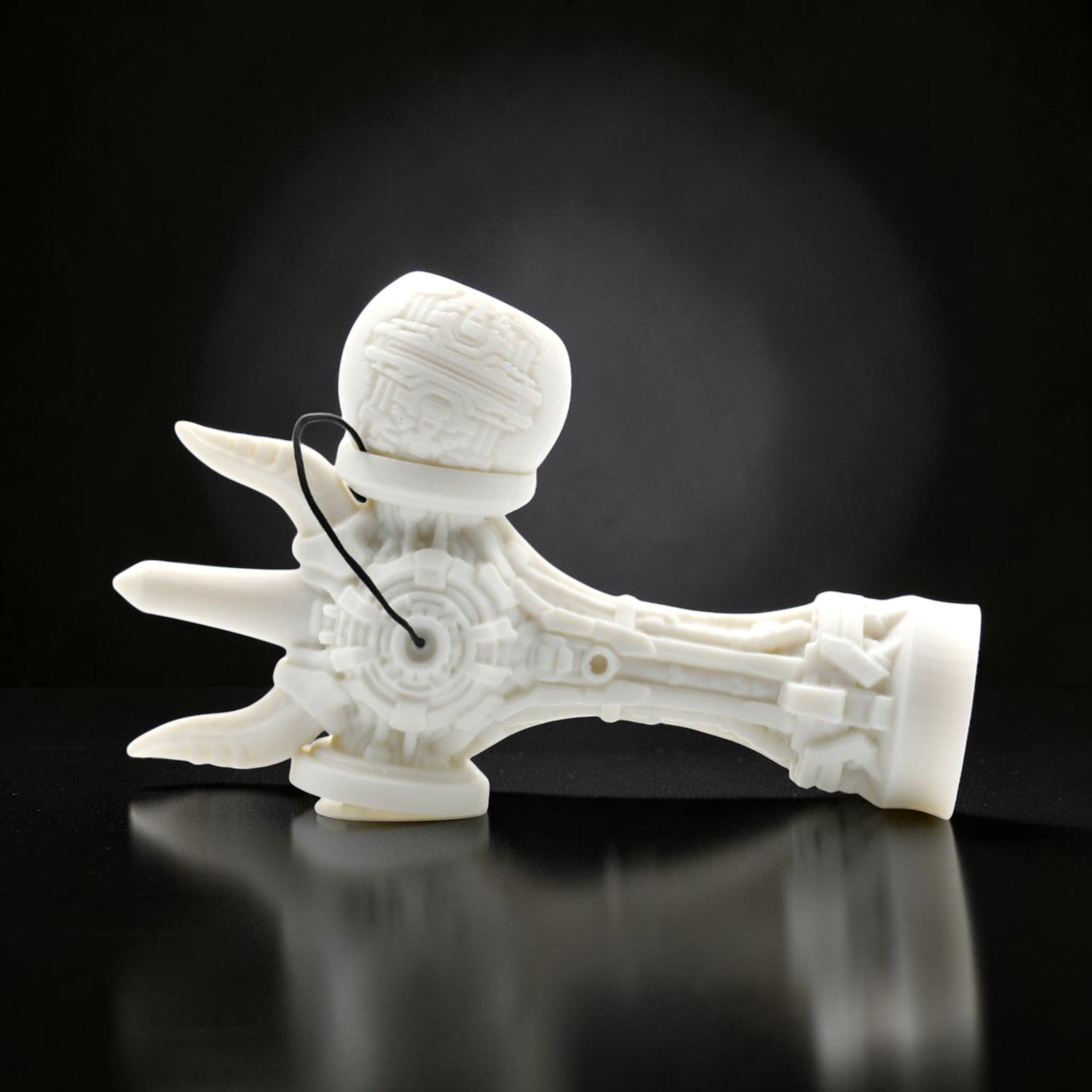 Tom GO Kendama Geeker TOM Angel, a white, intricately designed skill toy with geometric patterns and a futuristic aesthetic.