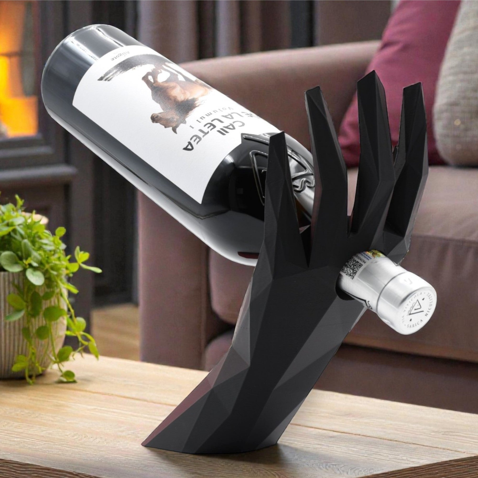 Tom GOH black geometric hand-shaped acrylic wine bottle holder stand
