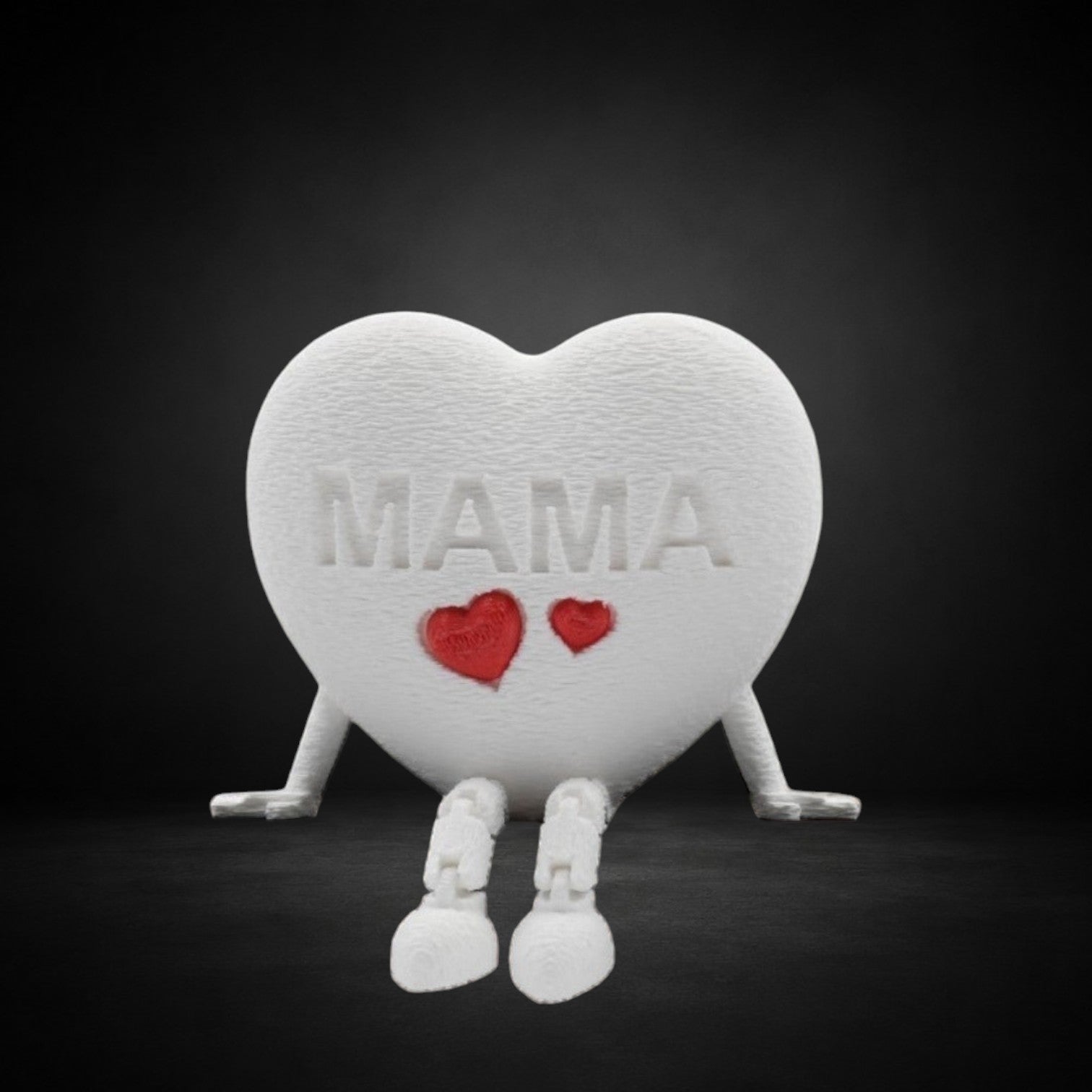 Tom Goh white textured heart figurine with "MAMA" embossed and two red hearts, articulated legs.