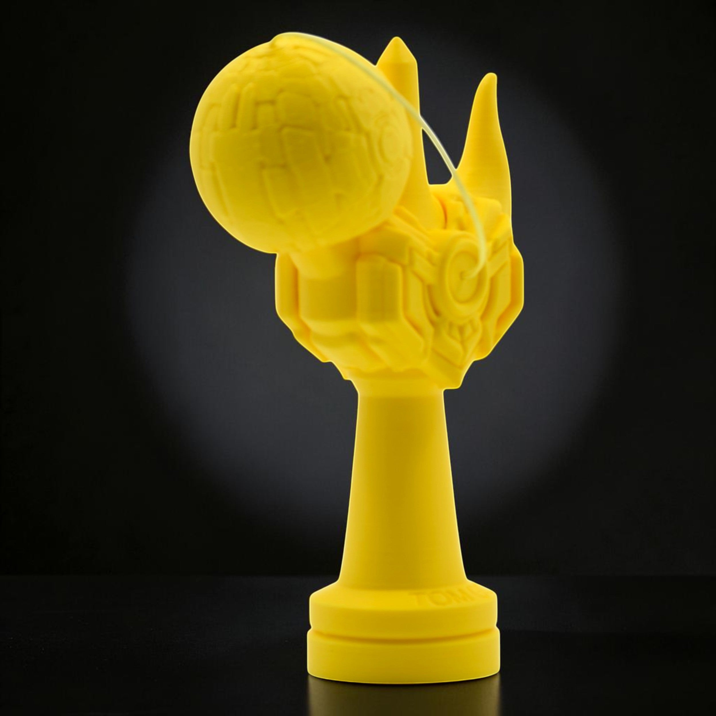 Tom Kendama Geeker Iron M, bright yellow, durable construction, designed for precision play.